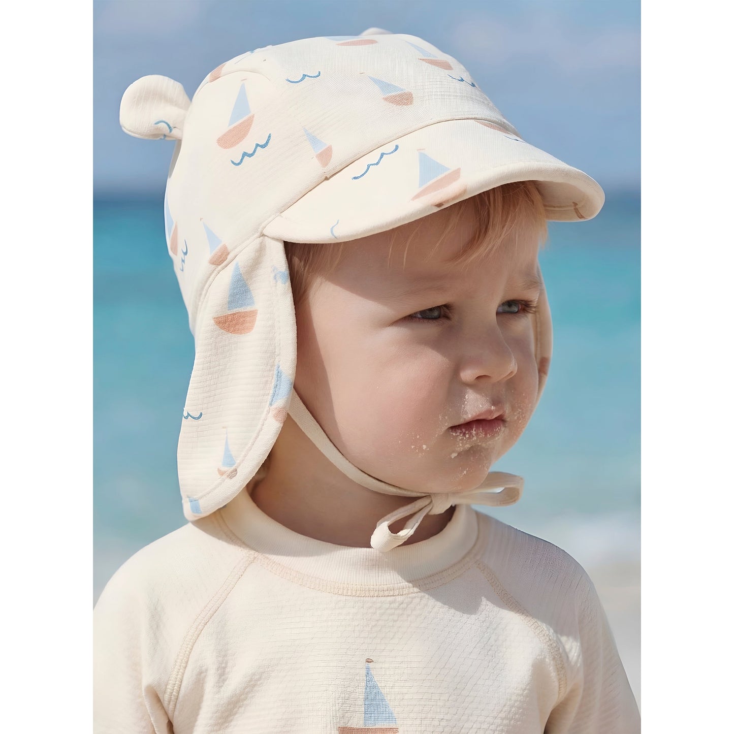 Gorra con protección solar Calypso Blanco Azul 3-12m